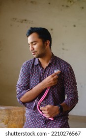 South Asian Young Male Doctor Holding A Stethoscope Wearing Shirt 