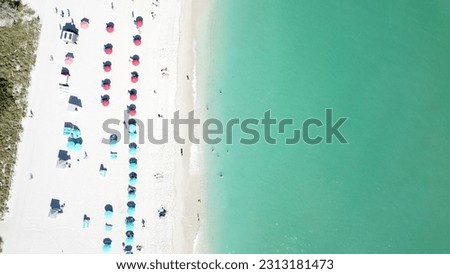 Similar – Luftaufnahme von fliegenden Drohnen der Menschenmenge, die sich am Strand in Rumänien am Schwarzen Meer entspannen.