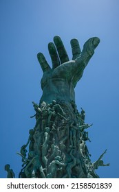 South Beach, Miami, Florida - May 5th, 2022 - Holocaust Memorial, Raised Hand Covered In Suffering Bodies