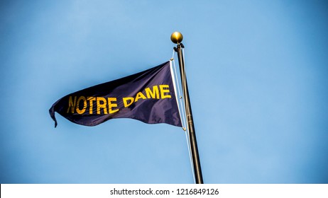 South Bend, Indiana - October 30 2018: Notre Dame Fighting Irish Flag Flys In Wind Above Stadium