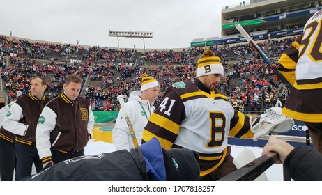 South Bend, IN / USA - January 1, 2019: Boston Bruins head coach Bruce Cassidy walks to the ice before the start of the 2019 NHL Winter Classic at Notre Dame Stadium.