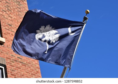 South Carolina Flag With A Blue Field, Moon And Palmetto Tree