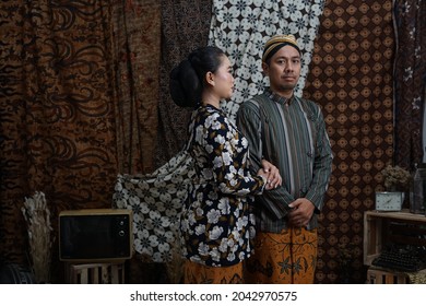 South East Asian Couple Wearing Javanese Traditional Dress