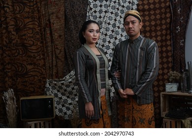 South East Asian Couple Wearing Javanese Traditional Dress