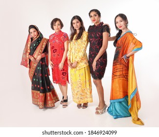 South East Asian Malay Chinese Indian Race Ethnic Origin Woman Wearing Dress Costume Baju Kurung Cheongsam Samfu Kebaya Sharee Multiracial Community On White Background