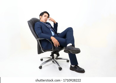 South East Asian Malay Man Facial Expression Sit On Chair Thinking