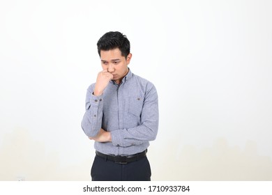 South East Asian Malay Man Facial Expression Sad Thinking Hand On Chin