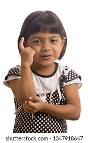 South East Asian Six Year Old Baby Girl With Thinking Pose 