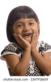 South East Asian Six Year Old Baby Girl With Surprise Expressions 