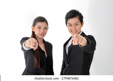 South East Asian Young Chinese Man Woman Wearing Formal Business Office Ware On White Background Point At Camera