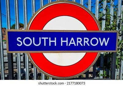 South Harrow, London, England, UK - July 9th 2022: South Harrow Station London Underground Metropolitan Railway Roundel Sign