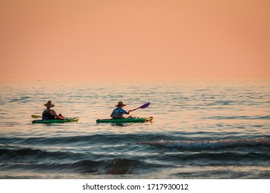 South Haven, MI /USA - September  16th 2017:  Kayakers On Lake Michigan At Sunset