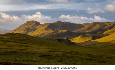 South Iceland mountain landscape in Vík í Mýrdal villages area with volcanic mountain ridge covered with moss, sunset view. - Powered by Shutterstock