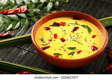 South Indian Curry Made Of Spiced Curd Or Buttermilk.