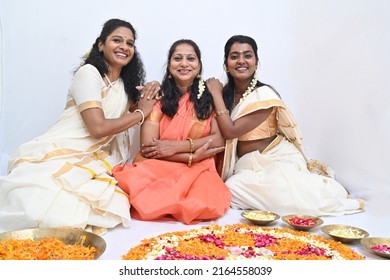 South Indian family celebrating Onam festival - Shutterstock ID 2164558039