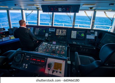 SOUTH ISLAND, NEW ZEALAND- MAY 25, 2017: Ferry Boat Pilot Command Cabin With The Captain Operating The Machines With A Beautiful View On The Sea, In New Zealand