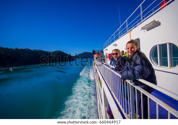 SOUTH ISLAND, NEW ZEALAND- MAY 25, 2017:\
Unidentified people enjoying the beautiful view from South island\
to North island at ferry in New\
Zealand
