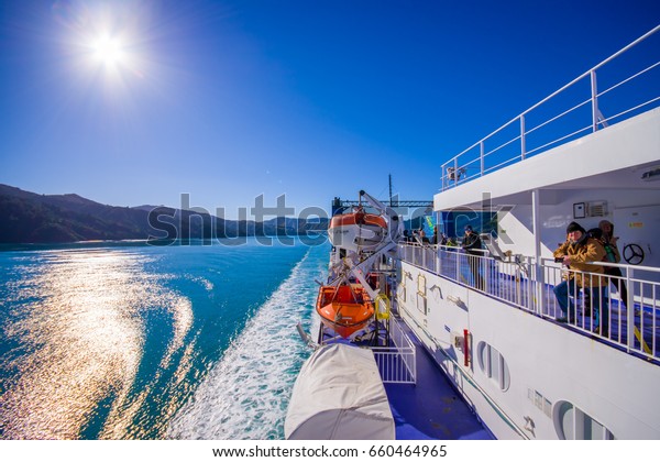 SOUTH ISLAND, NEW ZEALAND- MAY 25, 2017:\
Unidentified people enjoying the beautiful view from South island\
to North island at ferry in New\
Zealand