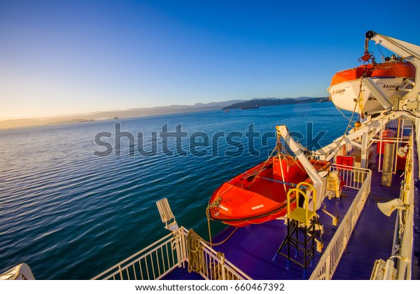 SOUTH ISLAND,\
NEW ZEALAND- MAY 25, 2017: Beautiful view of Ferries that provide\
daily connection between North and South islands with a beautiful\
blue sky located in New\
Zealand