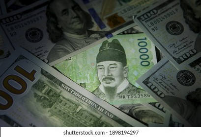 South Korea Currency 10000 Won And Us Dollars Background