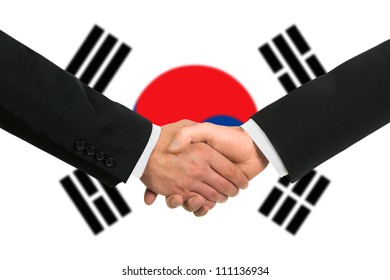 The South Korea Flag And Business Handshake