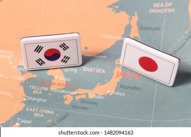 South Korea and Japan flags on map