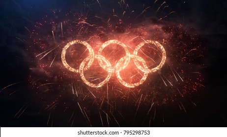 SOUTH KOREA PYEONGCHANG FEBRUARY 2018: Winter Olympic Games greeting rings logo with particles and sparks on night sky with fireworks, magic typography desing, editorial.