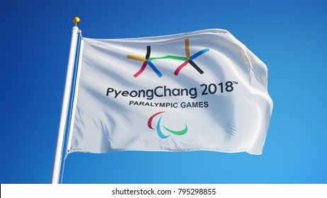 SOUTH KOREA PYEONGCHANG FEBRUARY 2018: Winter Paralympic Games Flag Waving In Against Blue Sky, Close Up