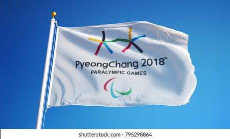 SOUTH KOREA PYEONGCHANG FEBRUARY 2018: Winter Paralympic Games Flag Waving In Against Blue Sky, Close Up