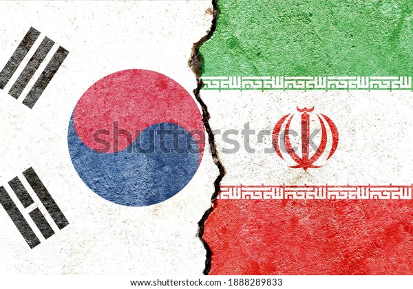 South Korea VS Iran national flags icon
isolated on broken weathered cracked concrete wall background,
abstract international political relationship friendship conflicts
concept texture wallpaper