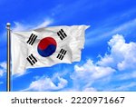 South Korean National Flag Waving In The Wind On A Beautiful Summer Blue Sky