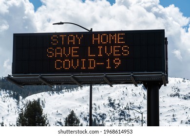 South Lake Tahoe, California United States - March 2020: Close-up Of A Digital Covid-19 Highway Sign In The Mountains That Reads 