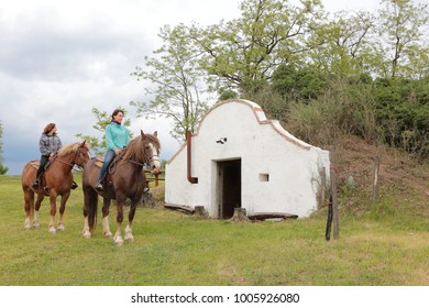 South Moravia, Czech Republic - 17 March 2015.: Wine Cellar And People On Horses