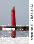 South Pierhead Light (1903) in Winter, Muskegon, Lake Michigan, Michigan, USA