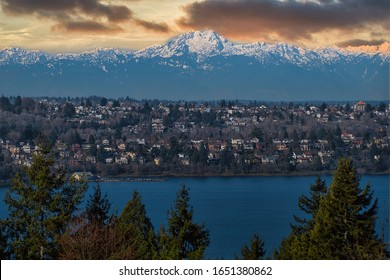SOUTH SEATTLE WITH THE OLYMPIC MOUNTAINS IN THE BACKGROUND WITH CLIDS