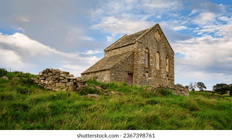 South Side of Swinburne Tithe Barn, located at Great Swinburne in Northumberland the Tithe Barn is Grade II Listed and used in the Middle Ages to store farmers contribution to sustain local clergy