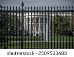 South Wall end Truman Balcony of the United States White House as seen from the other side of the black metal fence, President House Residence