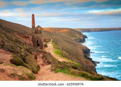 South West Coast Path As It Approaches The Ruins Of The Wheal Coates Mining Engine House Near St Agnes In Cornwall.