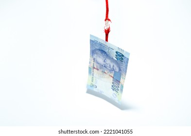 South-Africa rand is near collapsing while its hanging on a thread with zar note and damaged rope on white background