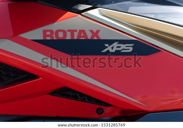 Southampton, Hampshire/UK -\
September 13 2019: Rotax XPS logo from the side of a personal\
watercraft or jet ski. High performance machine. Red with black and\
gold details.