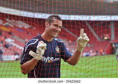 SOUTHAMPTON - JULY 17: Southampton Goalkeeper Kelvin Davis Stops His Warm Up To Pose Prior To The Testimonial Of  Claus Lundekvam, The Match Was Held At St Marys Stadium, Southampton, England.