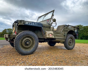 Southampton, UK - 3rd November 2019: Low Level View Of A British Military World War 2 Jeep With Red Cross Medical Bag And Army Camoflage Finish. Southampton Common, England.