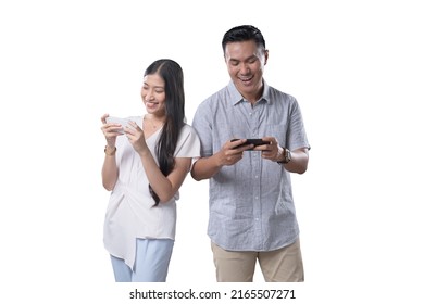 Southeast Asian Couple Playing Games With Mobile Phone