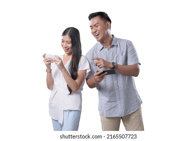 Southeast Asian Couple Playing Games With Mobile Phone