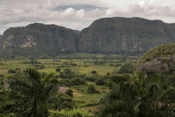 Southeast-to-northwest View Of The Viñales Valley From The Outlook On The 241 Road Overlooking The Hillfaces Of The Karstic Geomorphological Formations Called Mogotes. Pinar Del Rio Province-Cuba.