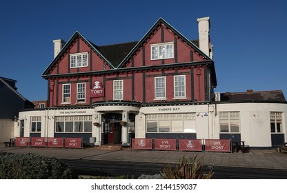 Southend-on-Sea, UK - 9 January 2022: The Halfway House, a Toby Carvery on the seafront in Thorpe Bay, Southend-on-Sea, Essex, UK with no people in view.