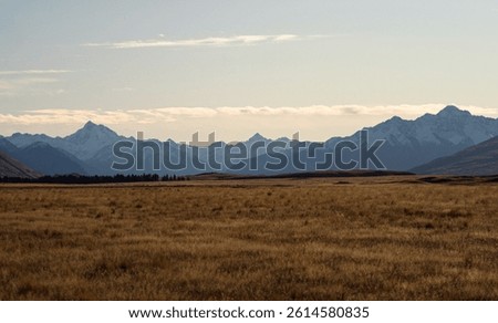 Southern Alps idyllic remote calm serene snow capped mountain peaks, Lake Emma winter landscape, Ashburton Lakes Canterbury South Island New Zealand