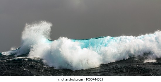 The Southern Arctic Circle. Atlantic Ocean. Storm. Large Waves With Sharp Gusts Of Wind.