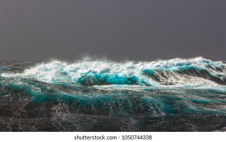 The Southern Arctic Circle. Atlantic Ocean. Storm. Large Waves With Sharp Gusts Of Wind.