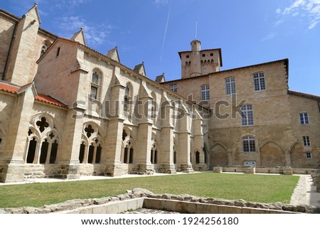 The southern facade of the Saint-Robert abbey in La Chaise-Dieu and the Clementine tower